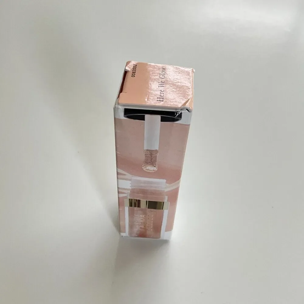 Laura Geller Luscious Liquid Cheek Glow In Here We Glow